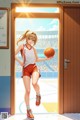 A woman holding a basketball standing in front of a door.